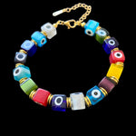 Mosaic Bracelet Santorini featuring colourful Murano-style glass cube beads with gold-tone spacers and an adjustable chain.