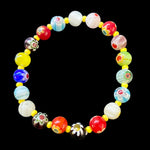 Mosaic Bracelet Amalfi featuring colourful Murano-style round glass beads with vibrant Mediterranean-inspired colours on a comfortable stretch bracelet.