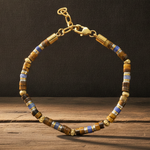 Terrain Canyon adjustable bracelet with Blue Sodalite, Yellow Tiger Eye and gold- and silver-tone stainless steel spacers.