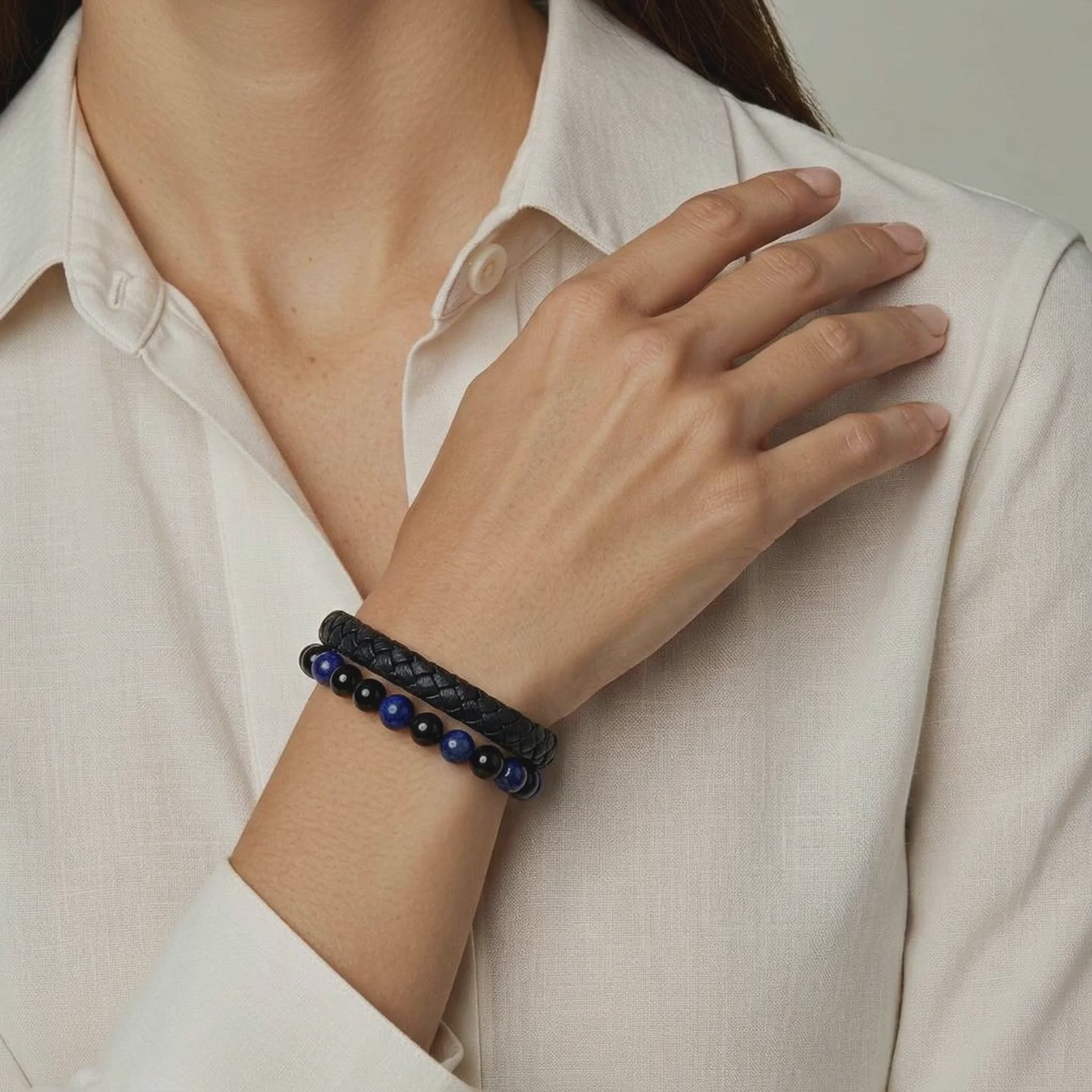Our female model video  wearing a lapis lazuli & onyx  leather bracelet