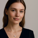 model wearing solitare moissanite necklace