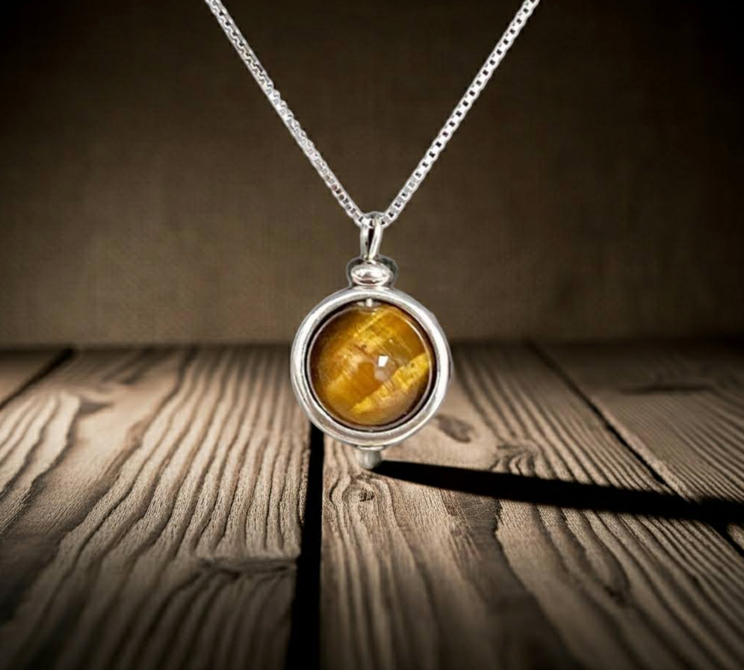 Tiger Eye Sphere  necklace with a sterling silver chain
